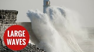 Large waves batter Porthcawl Lighthouse [upl. by Johnsson316]