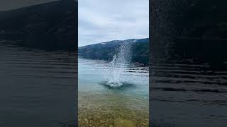 Big splash on the water  Water splashing rocks in slow motion  4K [upl. by Motteo]