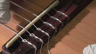 How to restring a classical guitar [upl. by Zendah899]